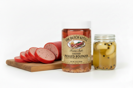 Jar of 'The Dutch Kettle' home-style smoked pickled bologna with a white cap.