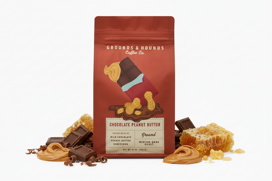 Red coffee bag from Grounds & Hounds Coffee Co. with chocolate peanut butter flavor description.